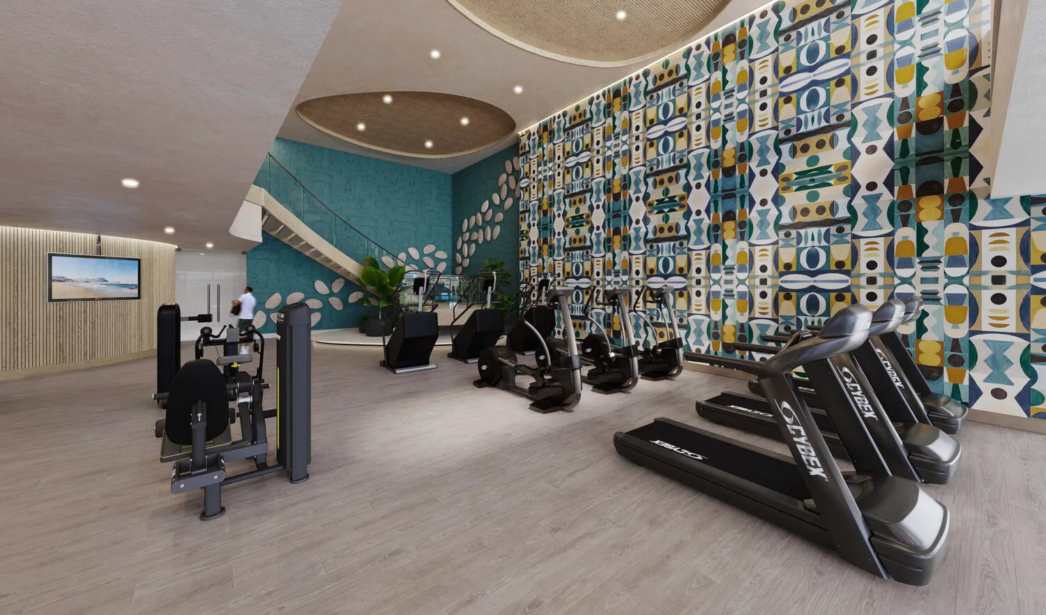 Modern fitness center at the Zemi Miches All-Inclusive Resort. Cardio and weight equipment.
