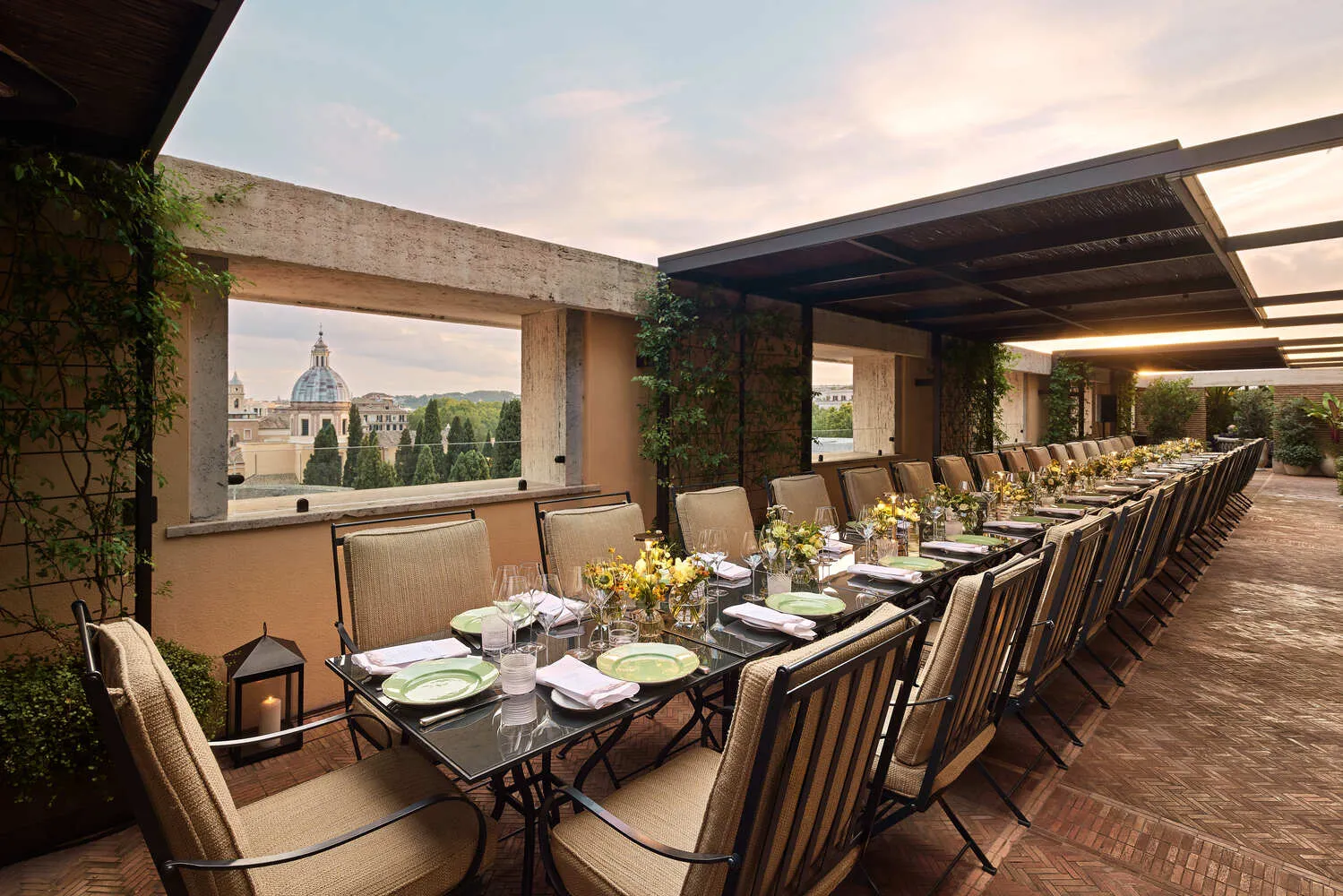 Elegant rooftop wedding reception at the Bvlgari Hotel Roma, overlooking the city.