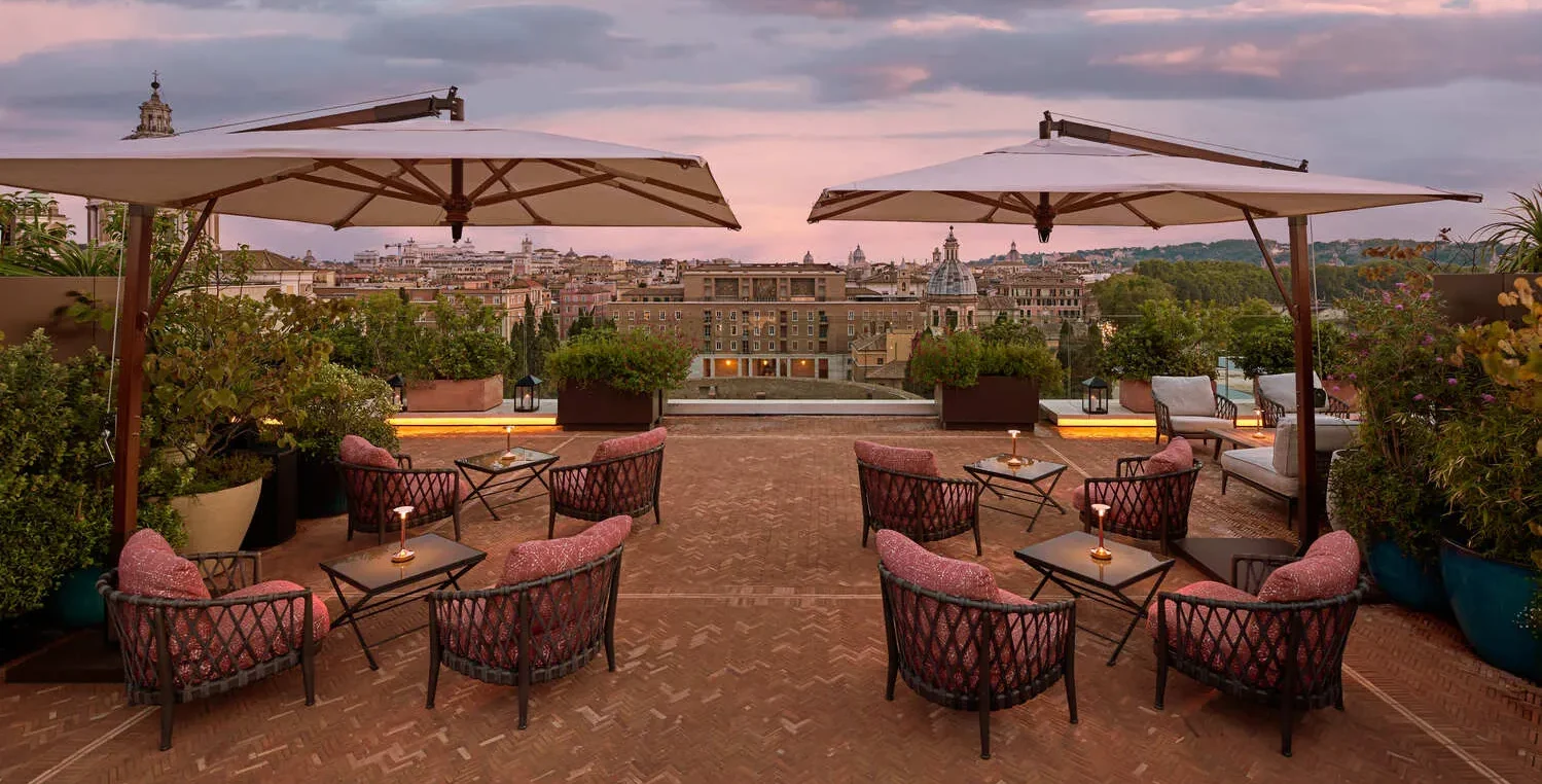 Romantic rooftop terrace at the Bvlgari Hotel Roma, perfect for weddings.