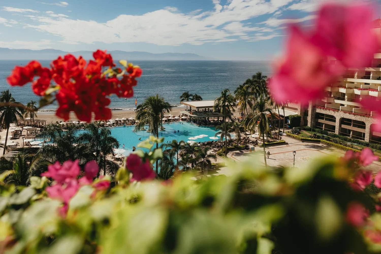 Luxury resort pool and beach in Puerto Vallarta, ideal for a destination wedding.