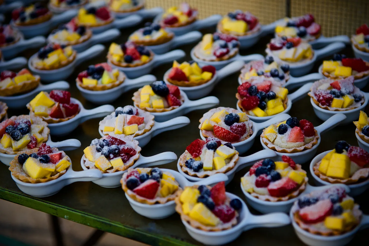 Rows of mini fruit tarts at a Puerto Vallarta destination wedding.