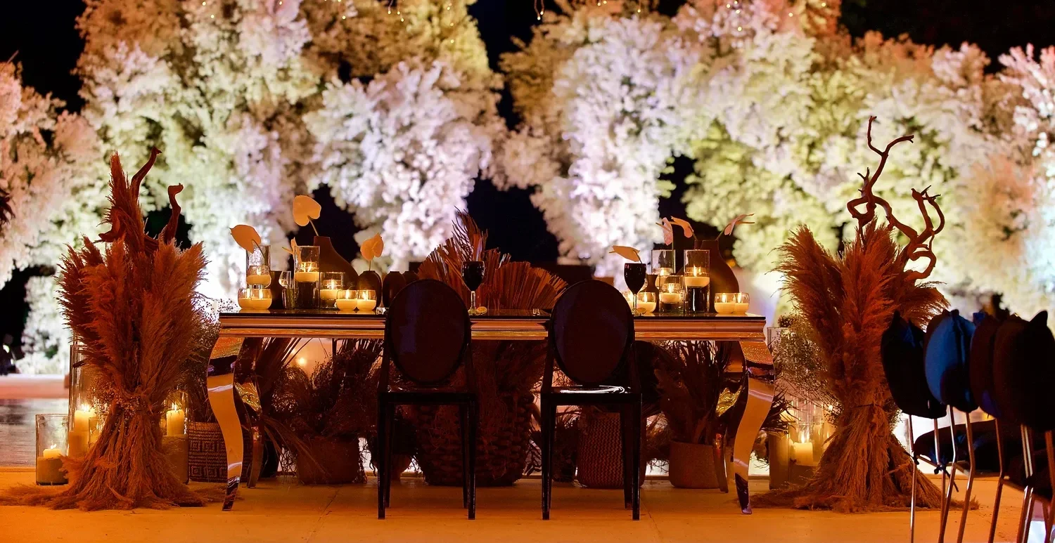 Romantic destination wedding reception table setting at a Puerto Vallarta resort.