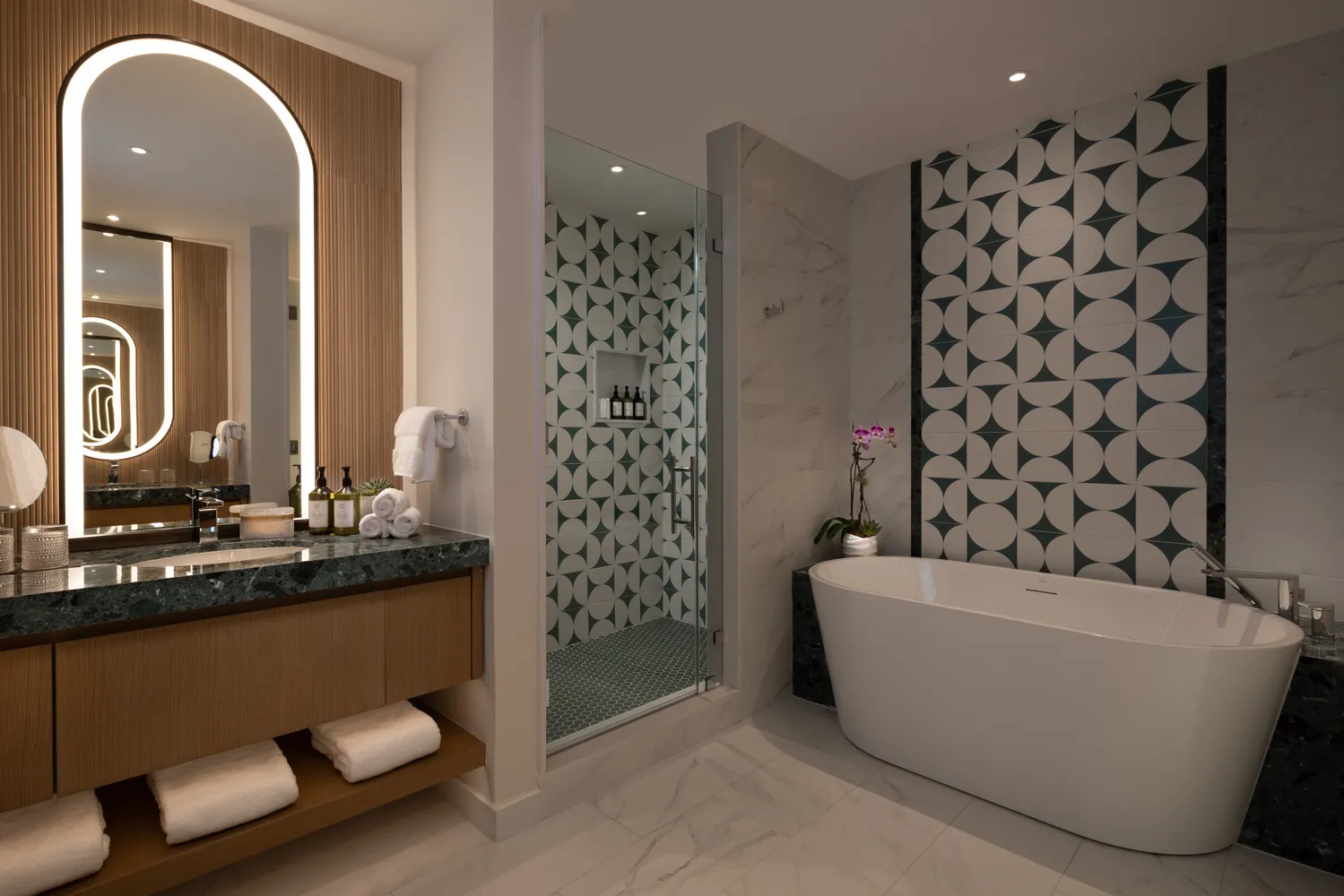 Elegant bathroom at Pier Sixty-Six with modern bathtub and vanity