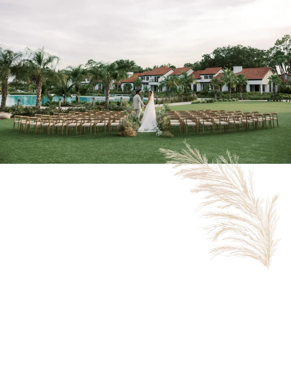 Bride and groom walking down the aisle at their outdoor wedding ceremony at the Conrad Orlando.